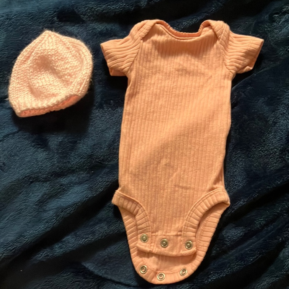 Preemie onesie and knit hat, both worn once.